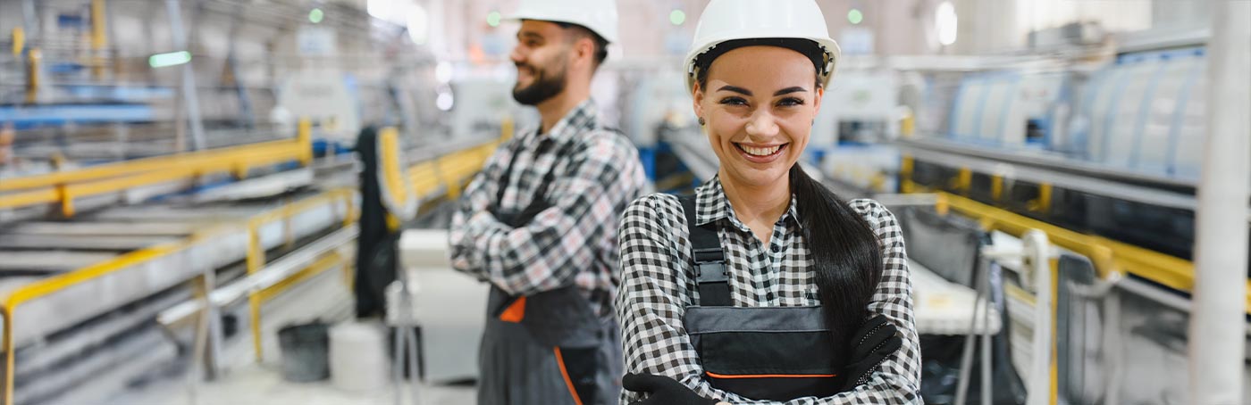 A woman and man working at a warehouse